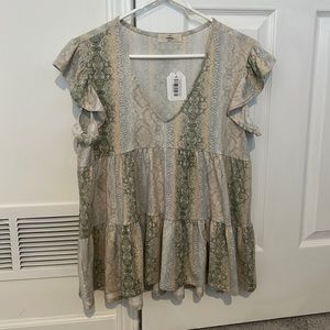 NWT, size small babydoll v-neck shirt.